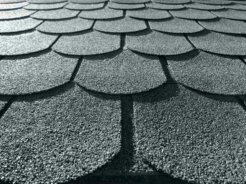 Image of gray shingles on a rooftop.