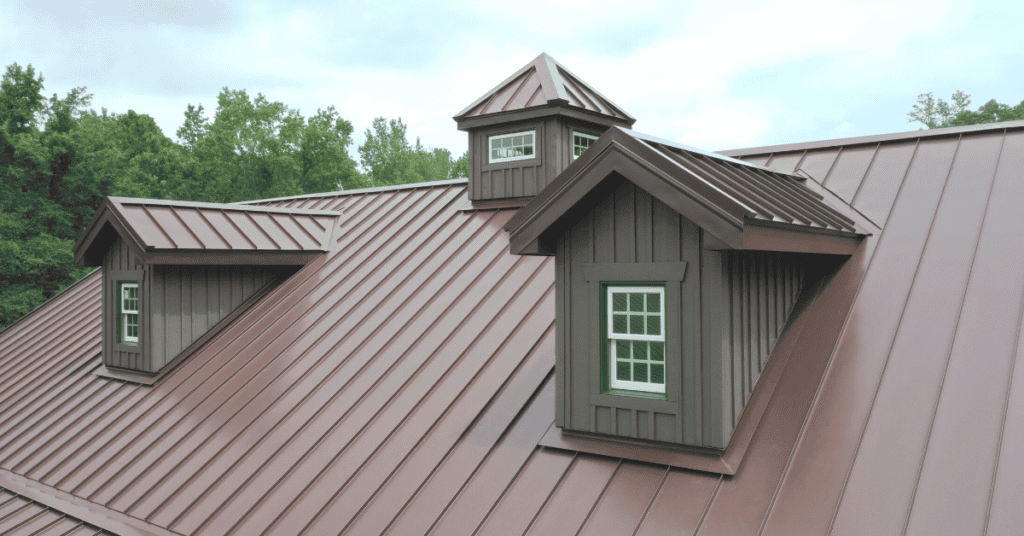 metal roof with attic windows and skylight