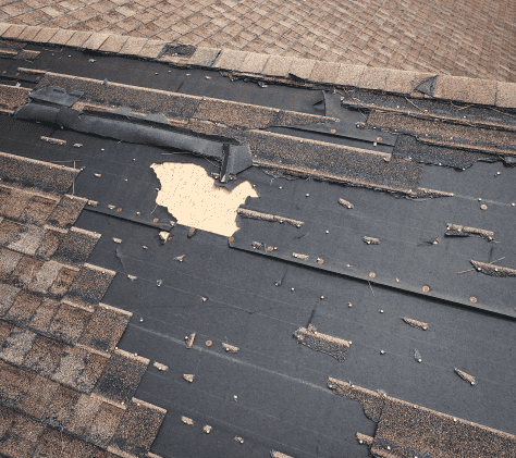 exposed underlayer of roof after hurricane