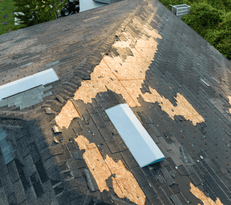 damaged-house-roof-with-missing-shingles