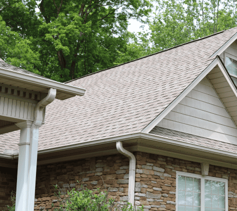 new asphalt shingle roof on stone brick house 1 1