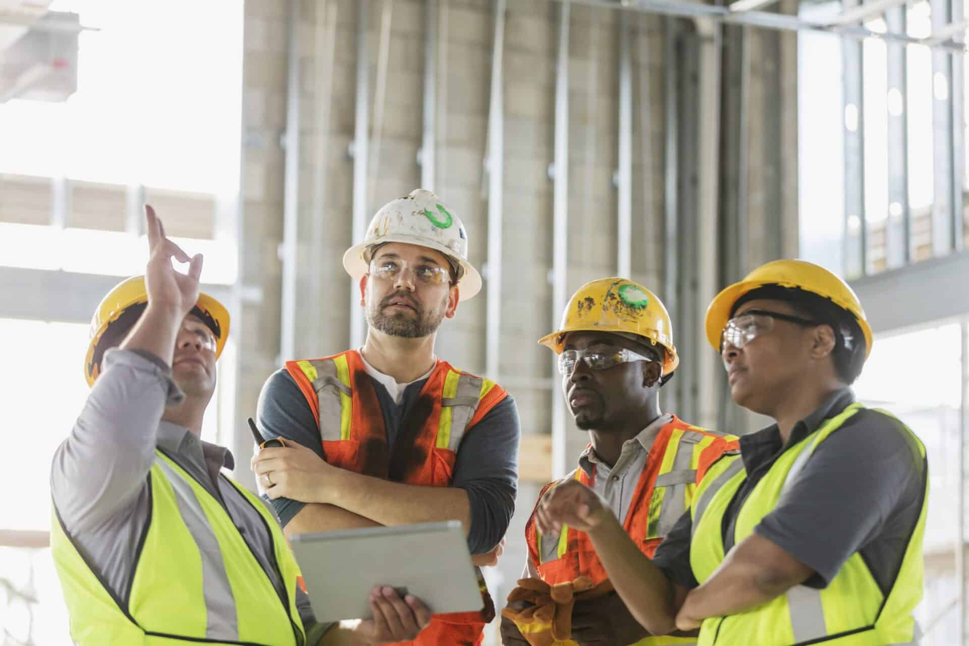 workers discussing project