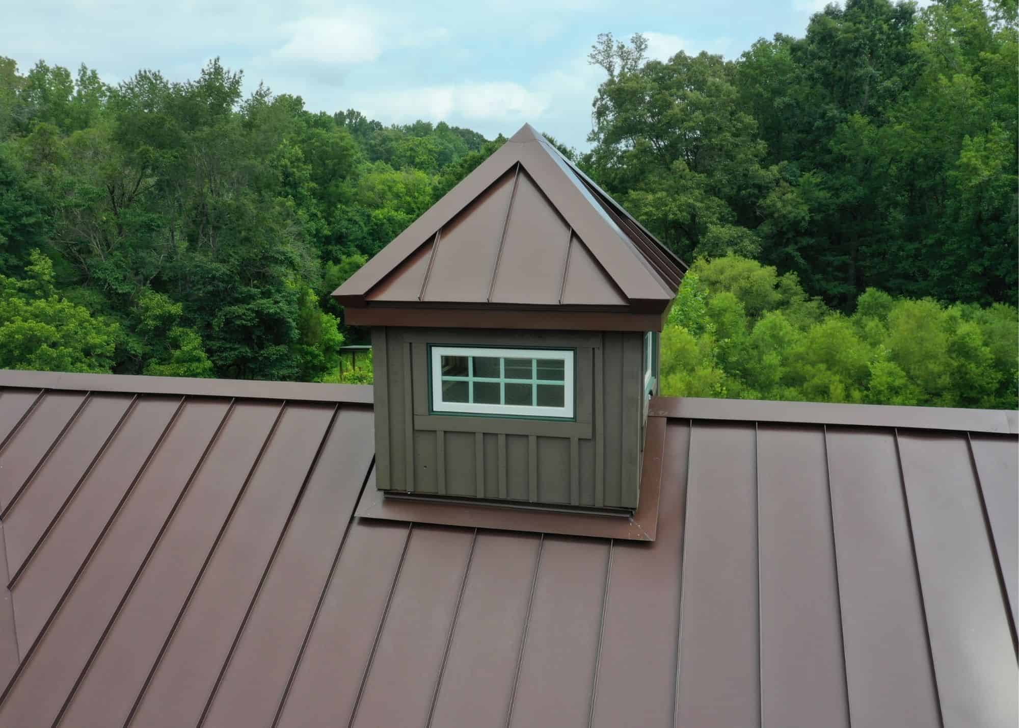 a close up view of a very detailed skylight project with a brown metal roof