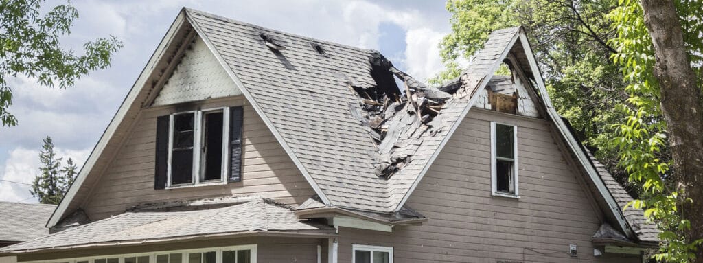 badly damaged roof and attic